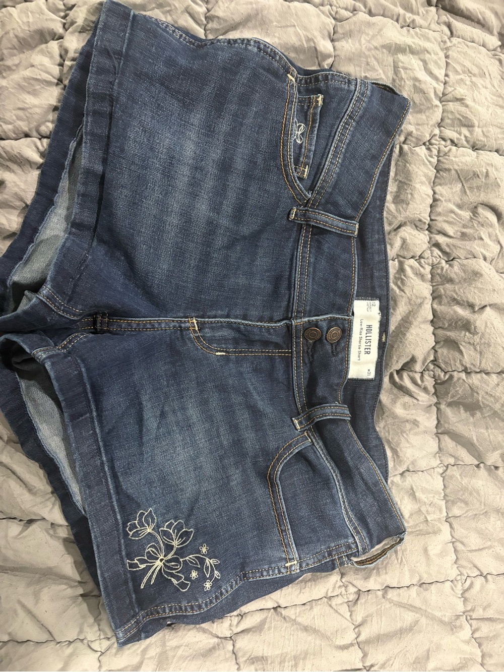 Hollister Women's Denim Shorts with White Floral Stitching worn twice size 12